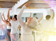 © JackF - Concentrated women and men rehearsing ballet dance in studio
