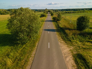 Wall Mural - Top view of the roads, landscape and roadside from the height of a flying drone. 