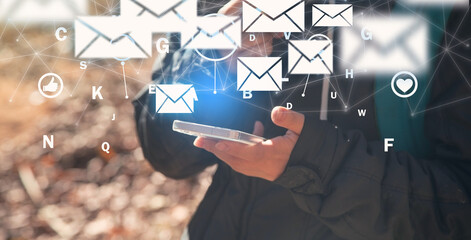 Wall Mural - human using smartphone. communication. e-mail marketing concept