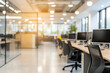 © Evhen Pylypchuk - Defocused modern business office background, featuring blurred desks and glass partitions, creating a sleek and professional atmosphere