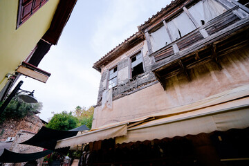 Wall Mural - Street of old town district in Kaleici, where modern and wooden architecture collide.