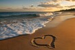 © Volodymyr - Heart shape drawn in the beach sand with ocean waves gently washing ashore at sunset