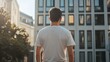© Павел Озарчук - Mockup of man wearing customizable t-shirt, rear view
