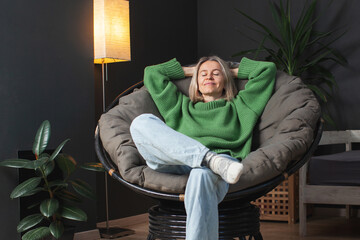 happy middle aged woman relaxing at home