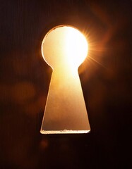 Poster - Golden light shining through keyhole creates dramatic effect
