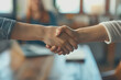 © PHAISITSAWAN - Businessmen join hands to jointly do business and achieve business success.