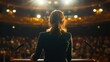 © Madhan - Speaker at Podium Addressing Audience in Brightly Lit Theater