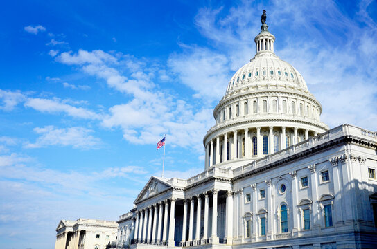 United States Capitol Building in Washington DC on Bright Sunny Day with Blue Sky