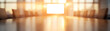 © Alex - A sunlit conference room with a long table and empty chairs ready for a meeting.