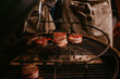 © Melissa Milis Photography/Stocksy - delicious meats grilling on barbecue with perfect sear and flavor.