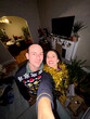 © tessy morelli/Stocksy - UGC POV Holidays Couple Selfie at home