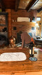 © tessy morelli/Stocksy - UGC Cosy moment making fire at the cottage