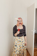 © Melika Tursic/Stocksy - woman posing with clean brush