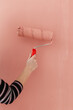 © Melika Tursic/Stocksy - Paint roller on a pink wall