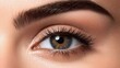 © Albert - a close up of a woman's eye with long eyelashes