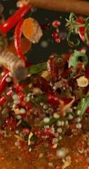 Poster - Super Slow Motion of Flying and Rotating Spices Mix. Filmed on High Speed Cinema Camera, 1000 fps. Vertical Aspect Ratio.
