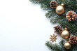 © Evhen Pylypchuk - Christmas-themed flat lay with pine branches, golden ornaments, and snowflakes on a white background. Clean layout with space for text, perfect for holiday greetings