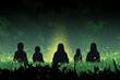 © jr-art - A group of people are sitting in a field of grass