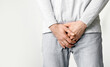 © Prostock-studio - Man feeling pain in groin inflammation or bladder problem, cropped