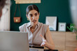 © BONNINSTUDIO/Stocksy - Financial advisor gesturing while explaining something during meeting