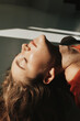 © Serge Filimonov/Stocksy - Woman relax in sunlight