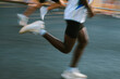© Duet Postscriptum/Stocksy - A runner blurred into motion during a city marathon