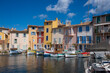 © Pepino de Mar studio/Stocksy - Colorful Harbor Houses and Boats