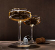 © Ingrid Bertens/Stocksy - Two glasses of champagne