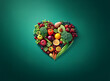 © joeycheung - Vibrant fruits and vegetables arranged in a heart shape against a teal background.  A healthy and colorful display emphasizing nutrition and well-being.