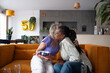 © Malquerida Studio/Stocksy - Happy women friends celebrating birthday