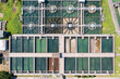 © Lawren Lu/Stocksy - Aerial View of Water Treatment Facility with Sedimentation Tanks