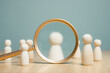© Garun Studios - human resources, hr, human, resource, employee, recruitment, job, manager, hiring, executive. A group of people are standing in front of a magnifying. Concept of curiosity and intrigue.
