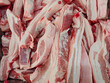 © fotobieshutterb - Fresh Cuts of Raw Pork Belly on a Market Stall Display