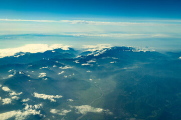 Wall Mural - aerial view of mountain range in fog