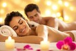 © ckybe - A romantic couples spa treatment features two individuals enjoying side-by-side massages in a chic, softly lit studio designed for ultimate relaxation.