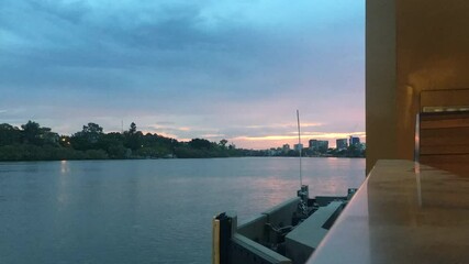 Wall Mural - Brisbane River Sunset with City Skyline and Setting Sun