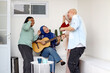 © Gatot - Asian Muslim Family Singing And Dancing Together