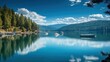 © vadosloginov - This picturesque location features the clear, reflective waters of Coeur d'Alene Lake, framed by vibrant greenery and under a bright blue sky dotted with clouds.