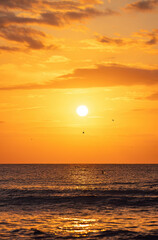 Wall Mural - beautiful sunrise over the sea water vertical landscape panorama