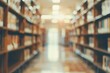 © darshika - Blurry college library interior for educational concepts.