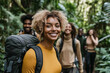 © agnes - Smiling woman with a backpack leading a group of diverse hikers in a lush green forest radiating adventure and camaraderie