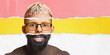 © master1305 - Creative collage made of different male face parts, creating portrait of man with beard, multicolor backgrounds. Concept of human diversity, emotions, equality