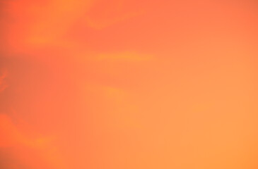 Wall Mural - vibrant orange sunset sky creating a serene and tranquil atmosphere, ideal for climate and environme