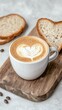 © LittleDreamStocks - Cappuccino foam art next to fresh bread slices, Coffee and Bakery, bread cappuccino