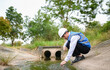 © SAHARAT - Water resources engineers are examining water samples from community sewers to determine the health of the water source.
