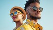 © Kan - Stylish young couple enjoying a sunny day at the beach, wearing fashionable sunglasses, vibrant clothing, and feeling confident against a clear blue sky backdrop