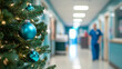 © eshana_blue - Decorated christmas tree adds a touch of holiday spirit to a busy hospital hallway