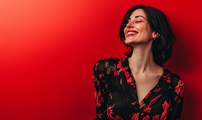 Wall Mural - Tempting happy woman wearing elegant blouse enjoying empty space at party isolated on a red color background.