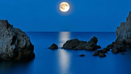 Wall Mural - Moonlit ocean scene with rocky coastline, tranquil