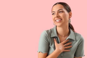 Wall Mural - Stylish young woman in beautiful jewelry on pink background